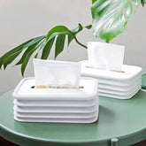 Foldable silicone tissue box holder in wave design on desk