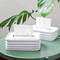 Foldable silicone tissue box holder in wave design on desk