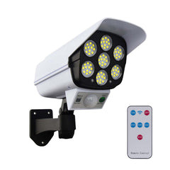 Motion activated solar dummy security light outdoors