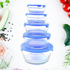 Close-up of glass bowl with lid holding fresh fruit salad