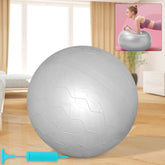 Woman performing Pilates exercises on a 75CM stability gym ball
