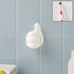 White hand-shaped wall clip with thumb grip