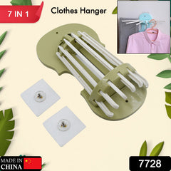 Side view of plastic multifunction retractable hanger on wall