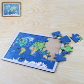 Wooden puzzle learning board with colorful pieces