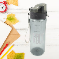 Plastic water bottle with bamboo lid close-up