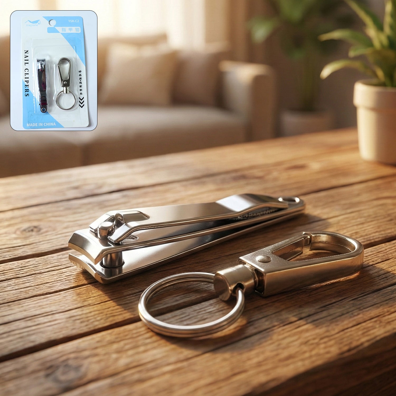 Stainless steel nail clipper with keychain holder