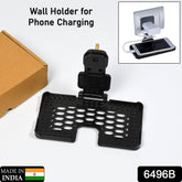 Black wall holder stand securing phone while charging