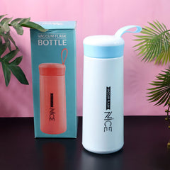 Blue plastic flask water bottle with white body and screw lid