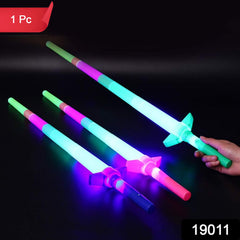 Child holding a glowing LED sword toy