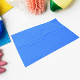Folded Magic Cleaning Towel on a clean white surface