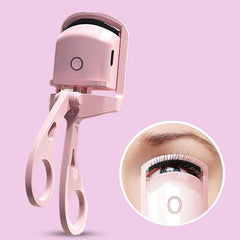 Electric Heated Eyelash Curler device on white background