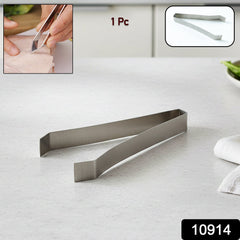 Close-up of stainless steel fish bone tweezer
