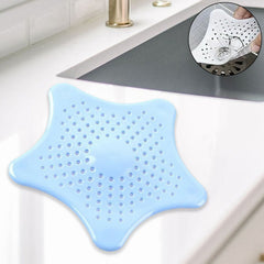 Star-shaped silicone sink filter on white background
