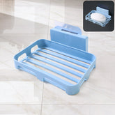 Self-adhesive plastic soap holder mounted in bathroom
