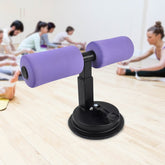 Ergonomic suction sit-up tool with foam handle on white background