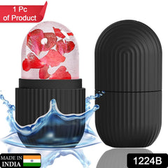 Face massager with ice roller on wooden surface