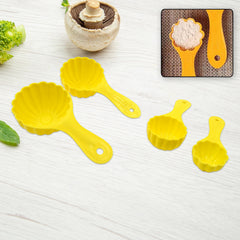 Close-up of a single plastic ladoo mould spoon