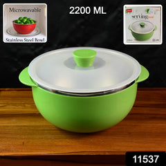 Microwave-safe plastic serving bowl with hot food inside and lid