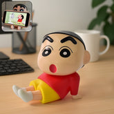 Shinchan Character Sitting Figurine in playful pose