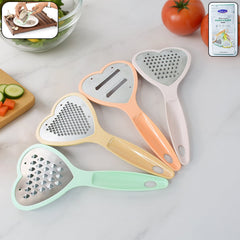 Heart-shaped grater and slicer set on white background