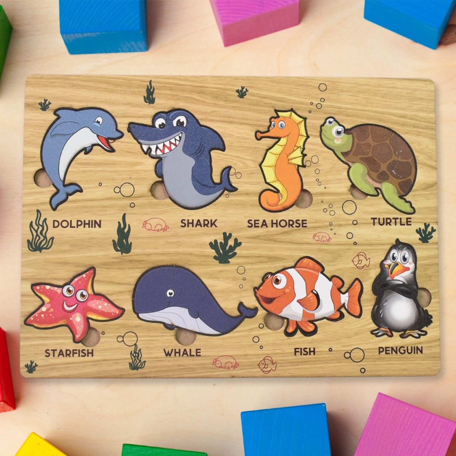 Wooden Sea Animal Puzzle Board with vibrant colored shapes