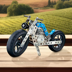 Metal bike construction kit components laid out