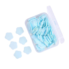 Open pack of 100 colorful flower-shaped travel soap sheets