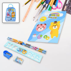 Stationery set contents showing pencils, sharpener, eraser, scale, and notebook