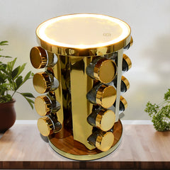 Side angle of golden LED rotating spice rack with filled jars