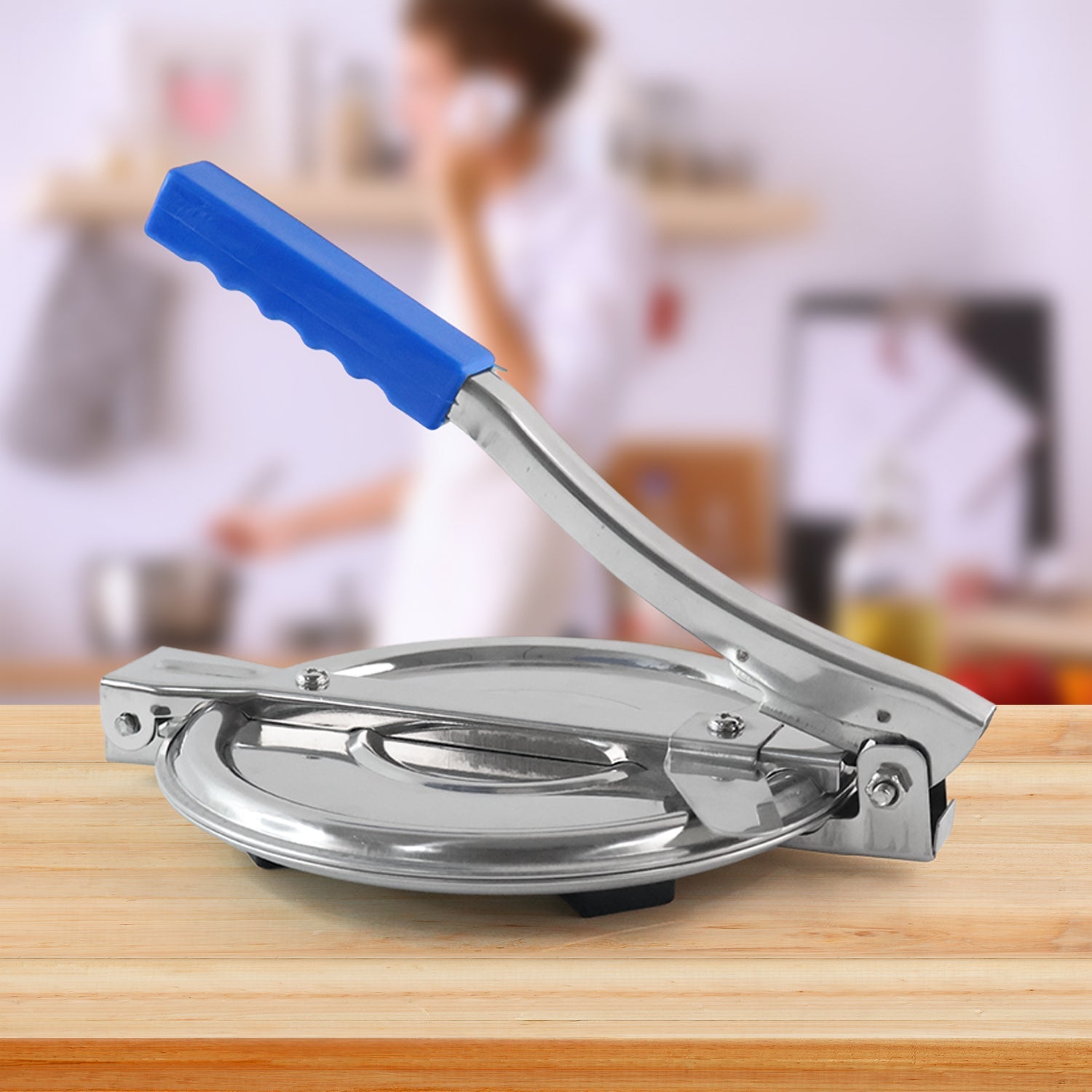 Medium stainless steel puri press maker front view
