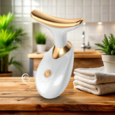 Neck Face Massager in dolphin tail shape showing front view