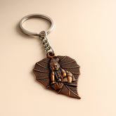 Antique bronze Bal Krishna peepal leaf metal keychain