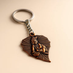 Antique bronze Bal Krishna peepal leaf metal keychain
