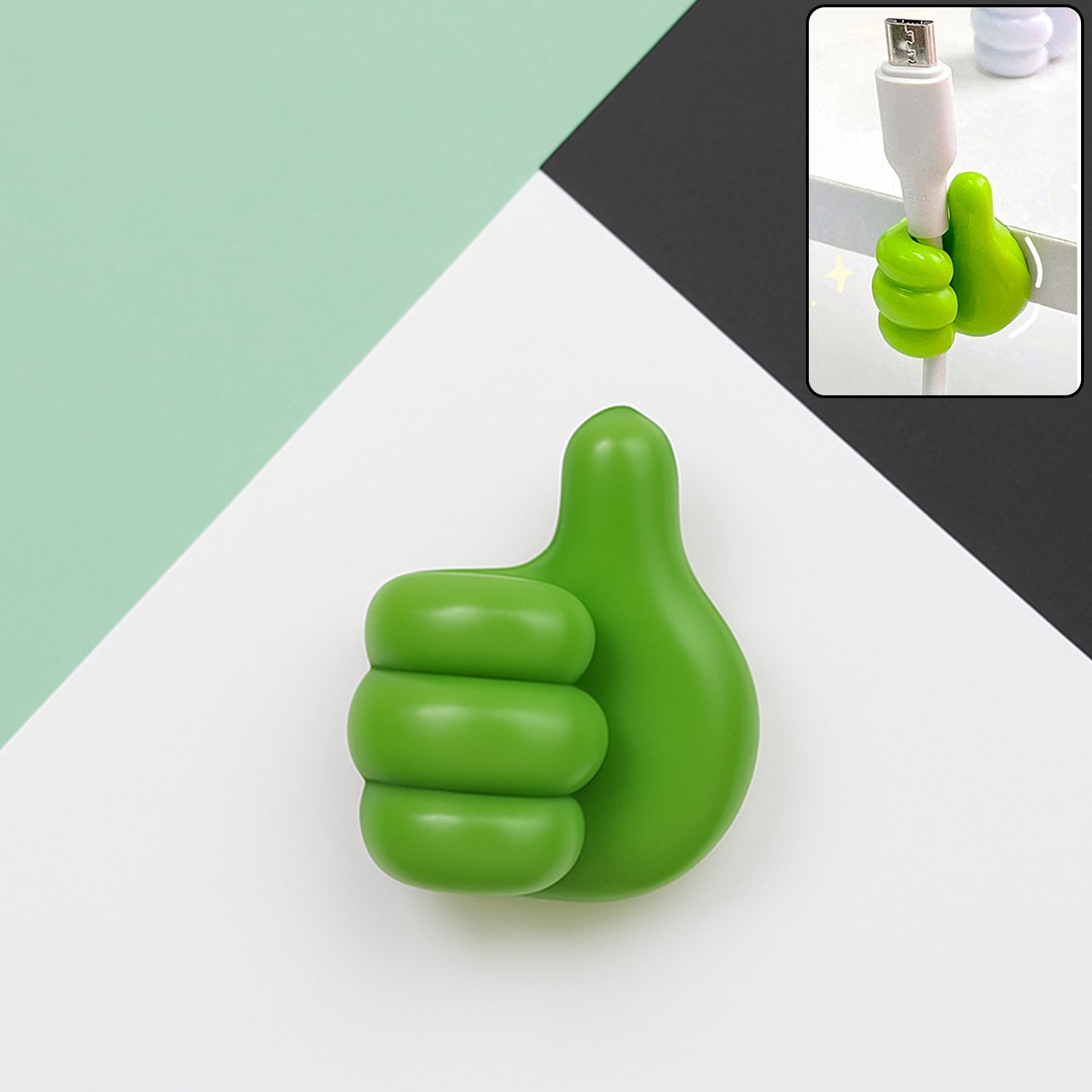 Green hand-shaped wall clip holder with thumb grip