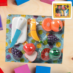 Close-up of sliceable toy fruits like apple & orange