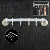 Wall-mounted bath towel hanger holding towels