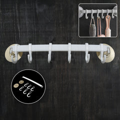 Wall-mounted bath towel hanger holding towels
