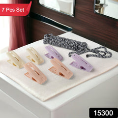 Strong clips securing clothes on drying rope