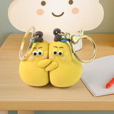 2-in-1 Cute Cartoon Couple Keychain hugging pair in soft rubber