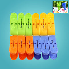 Multicolor plastic cloth clips packed in a set for drying clothes.