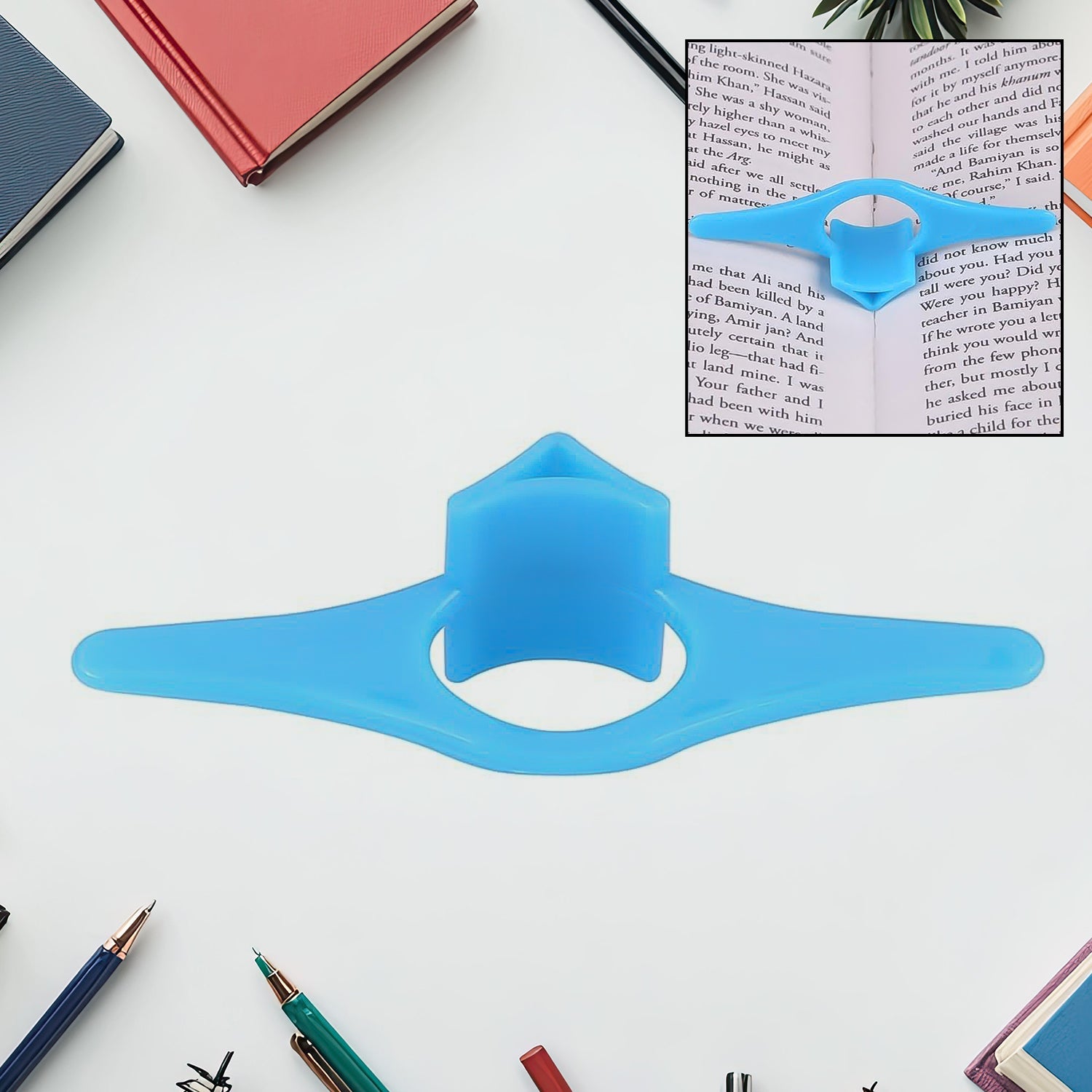 Plastic thumb book support holding pages open