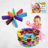 Kids setting up colorful wooden domino blocks in a line