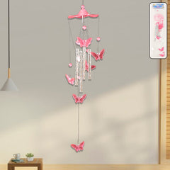 Butterfly Bell Wind Chime hanging outdoors with vibrant butterfly design