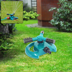 Three arm rotating garden sprinkler on grass