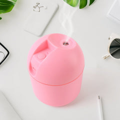 USB Mini Air Humidifier on desk with soft LED light