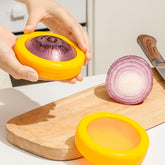 Yellow round produce saver container, front view