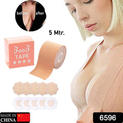 Detailed view of boob tape and nipple covers