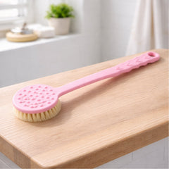 Side view of pink back scrubber with long handle