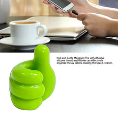 Key clipped on green hand-shaped holder