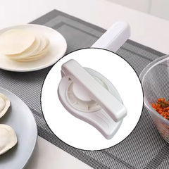Plastic puri press maker side angle showing handle